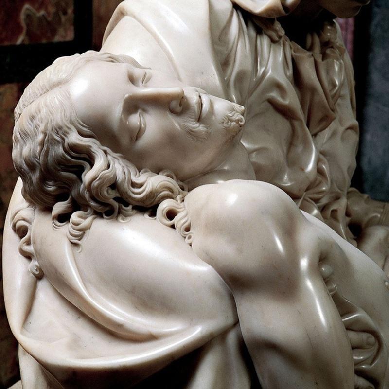 Крупный план лица Иисуса Христа из скульптуры «Пьета» Микеланджело